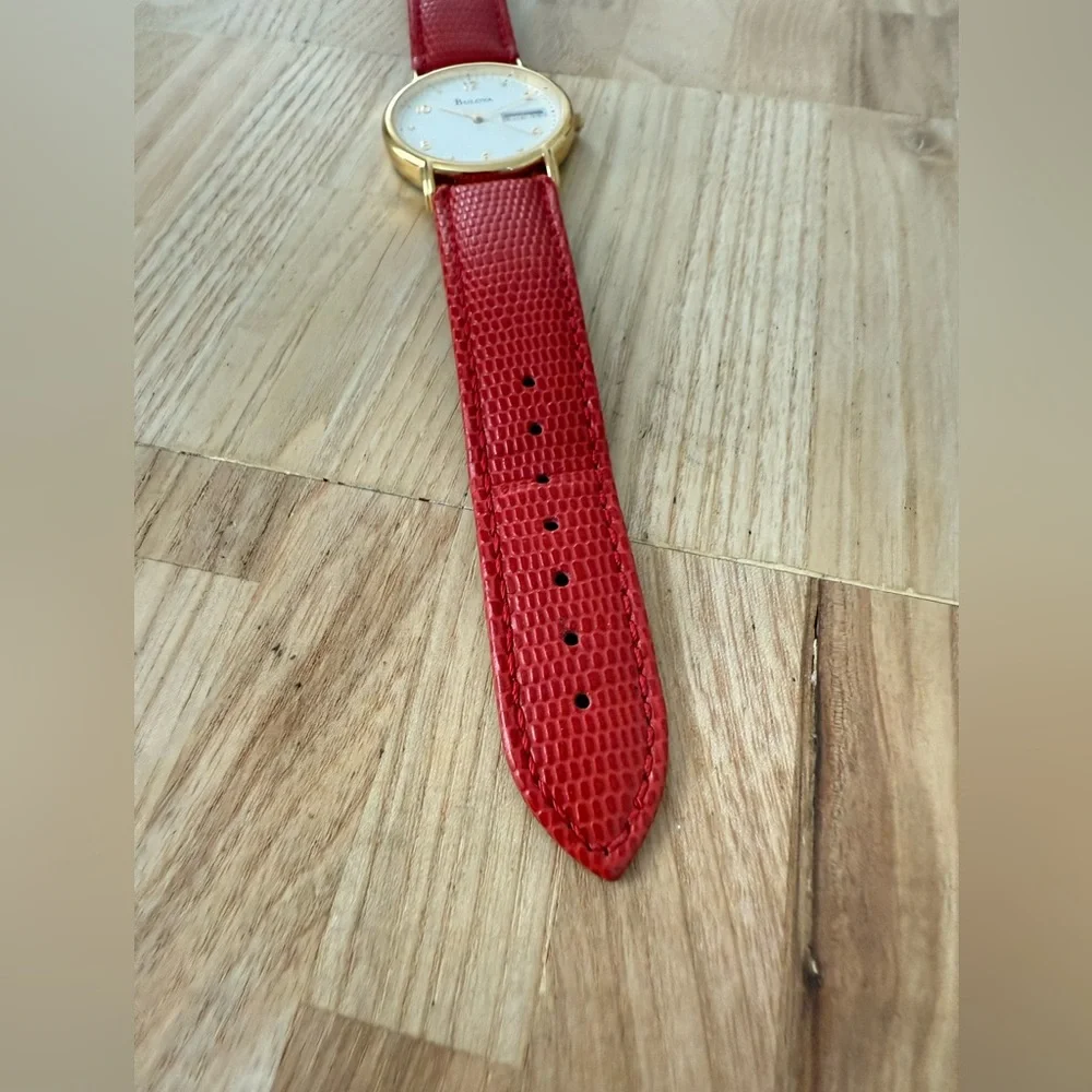 Bulova gold tone red leather watch NEW BATTERY